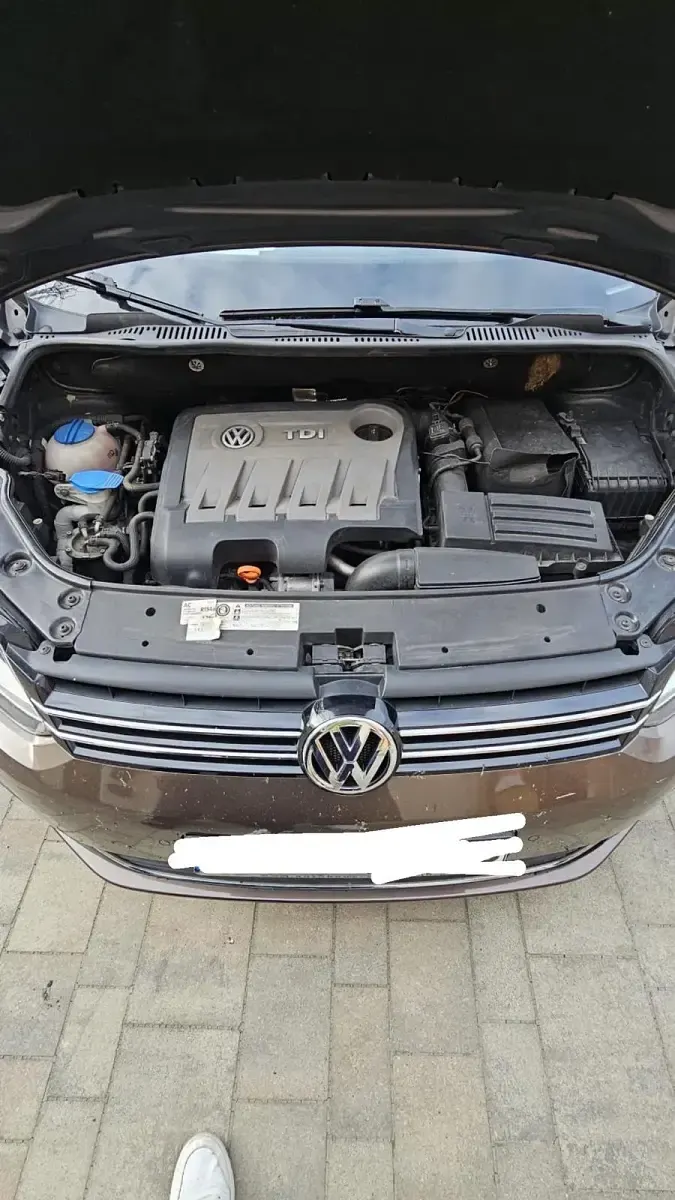 Używany VW Touran 105 KM (77 kW) 2012 Brązowy Minivan