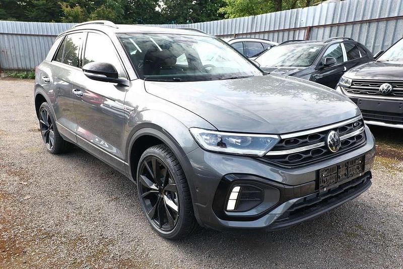 Indiumgrau metallic / da... Neu 2025 VW T-Roc R-line SUV | 35.685 € (Fairer Preis) - Bild 1/4
