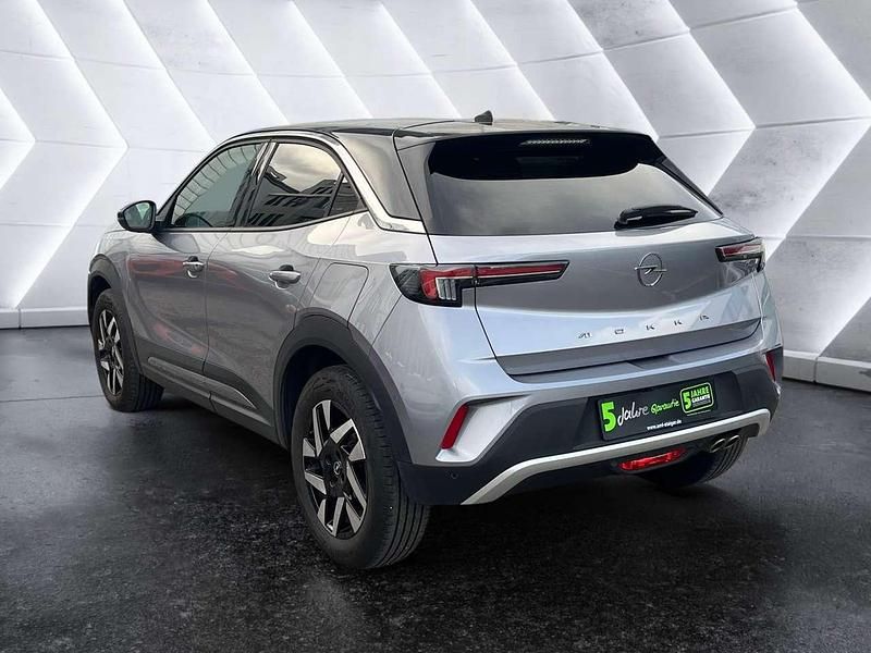 Gebraucht Opel Mokka Elegance 131 PS (96 kW) 2023 Kontrast grau/quarz silber SUV
