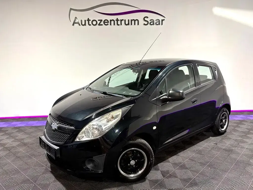 Gebraucht Chevrolet Spark 68 PS (50 kW) 2012 Schwarz Kleinwagen