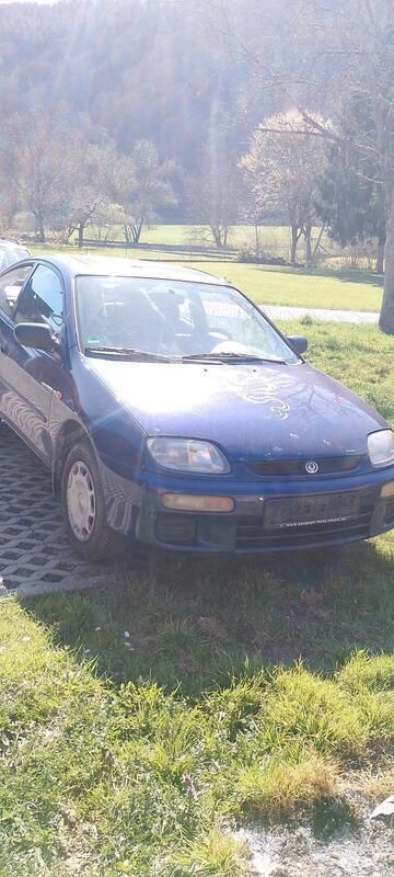 Blau Gebraucht 1996 Mazda 323C Kleinwagen | 650 € - Bild 1/4