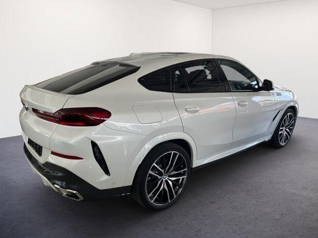 Mineral white mineral white Gebraucht 2024 BMW X6 M Sport SUV | 101.195 € (Teuer) - Bild 1/4