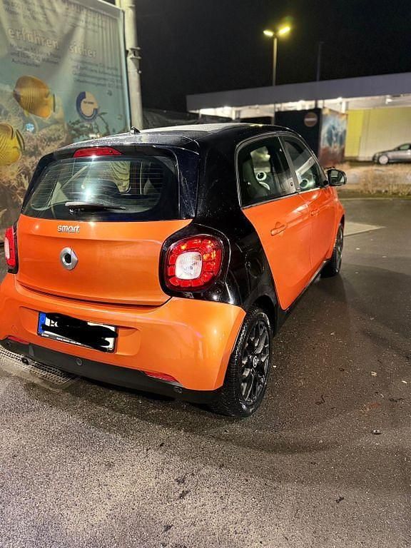 Gebraucht Smart ForFour Passion 71 PS (52 kW) 2015 Orange Kleinwagen