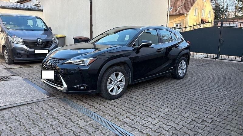 Grau Gebraucht 2022 Lexus UX 250h Executive Line SUV | 26.179 € (Guter Preis) - Bild 1/4