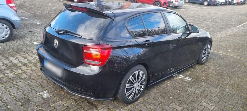 Gebraucht BMW 118 Sport Line 170 PS (125 kW) 2012 Schwarz Kleinwagen