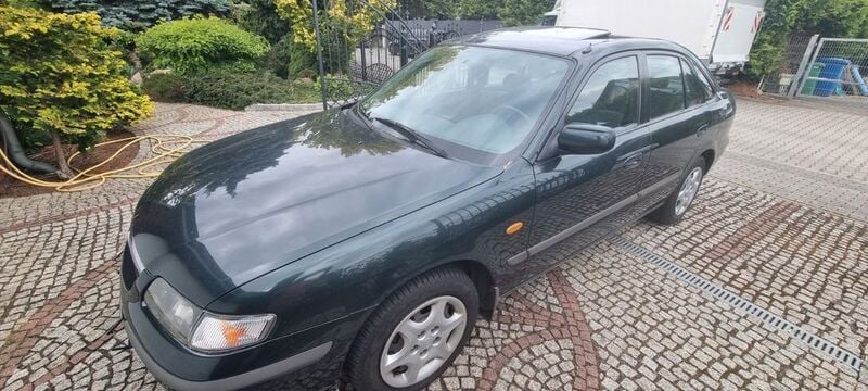 Grün Gebraucht 1997 Mazda 626 Limousine | 3.200 € - Bild 1/4