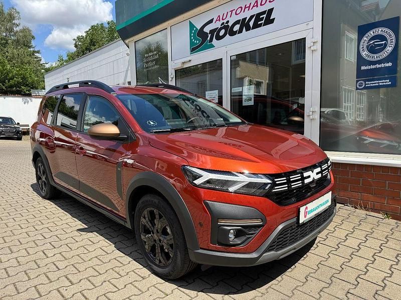 Braun Gebraucht 2024 Dacia Jogger Extreme Limousine | 20.950 € (Fairer Preis) - Bild 1/4