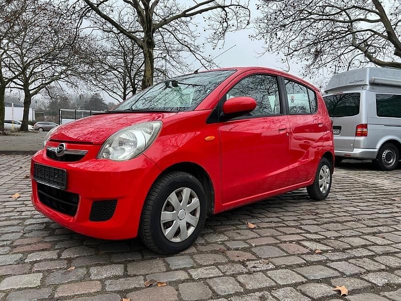 Gebraucht Daihatsu Cuore 69 PS (50 kW) 2010 Rot Kleinwagen