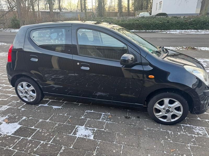 Gebraucht Nissan Pixo 68 PS (50 kW) 2010 Schwarz Kleinwagen