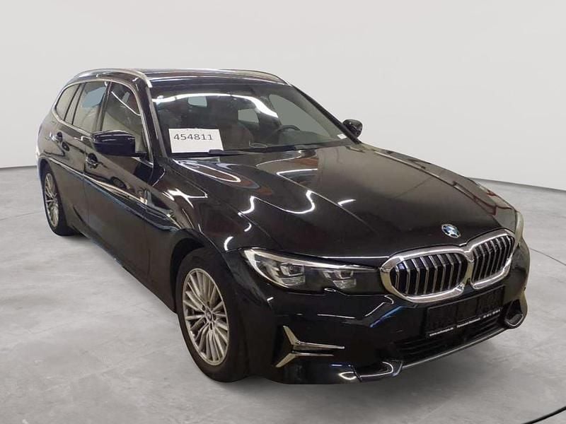 Saphirschwarz metallic Gebraucht 2020 BMW 320 Luxury Line Kombi | 22.390 € (Guter Preis) - Bild 1/4