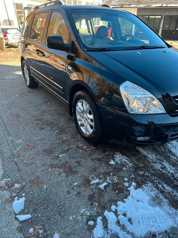 Schwarz Gebraucht 2009 Kia Carnival Van / Kleinbus | 2.699 € (Fairer Preis) - Bild 1/4