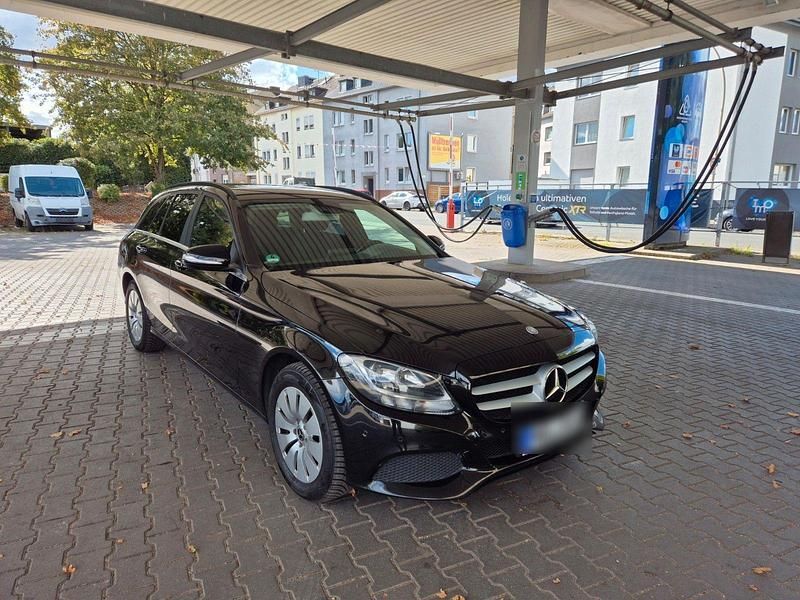 Schwarz Gebraucht 2015 Mercedes C220 AMG line Kombi | 9.990 € (Fairer Preis) - Bild 1/4