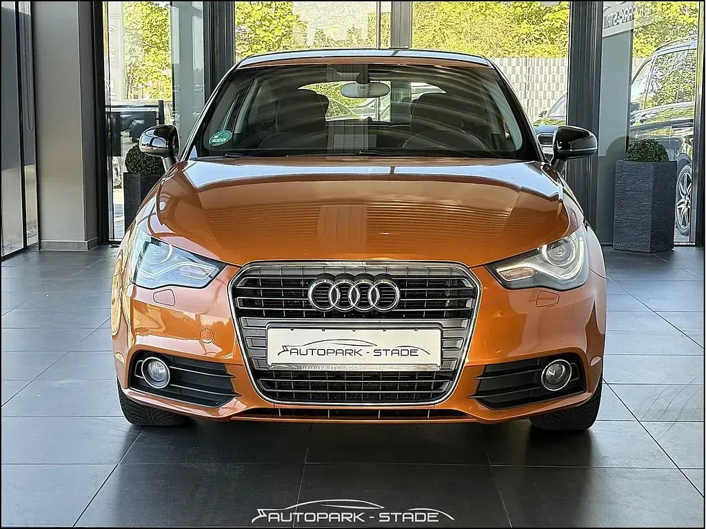 Second-hand Audi A1 Attraction 86 CP (63 kW) 2013 Portocaliu Hatchback