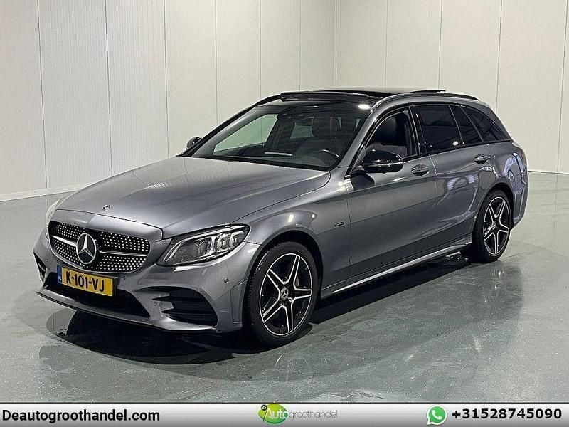 Grau Gebraucht 2021 Mercedes C300e Business Kombi | 15.125 € - Bild 1/4