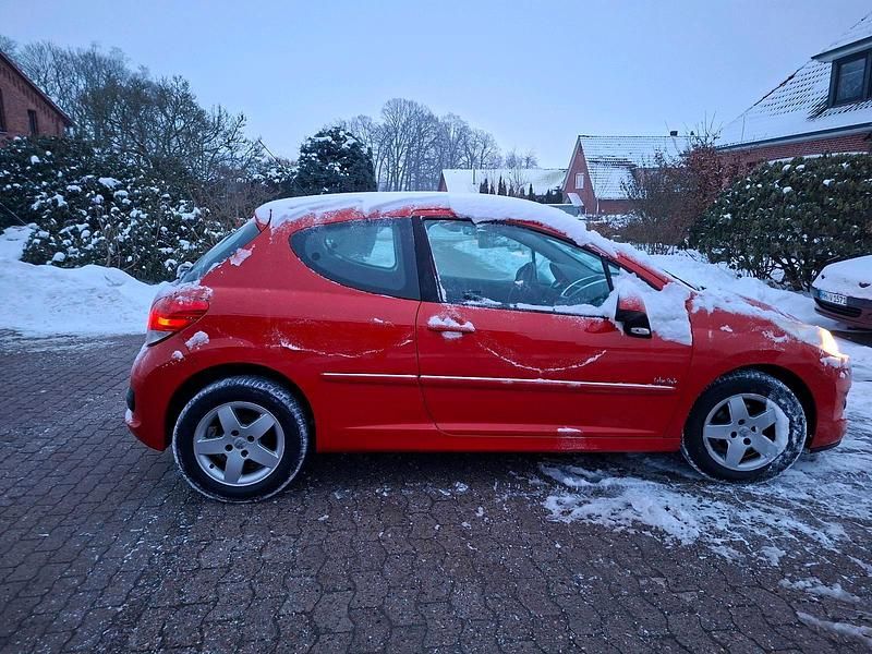 Gebraucht Peugeot 207 74 PS (54 kW) 2011 Rot Kleinwagen