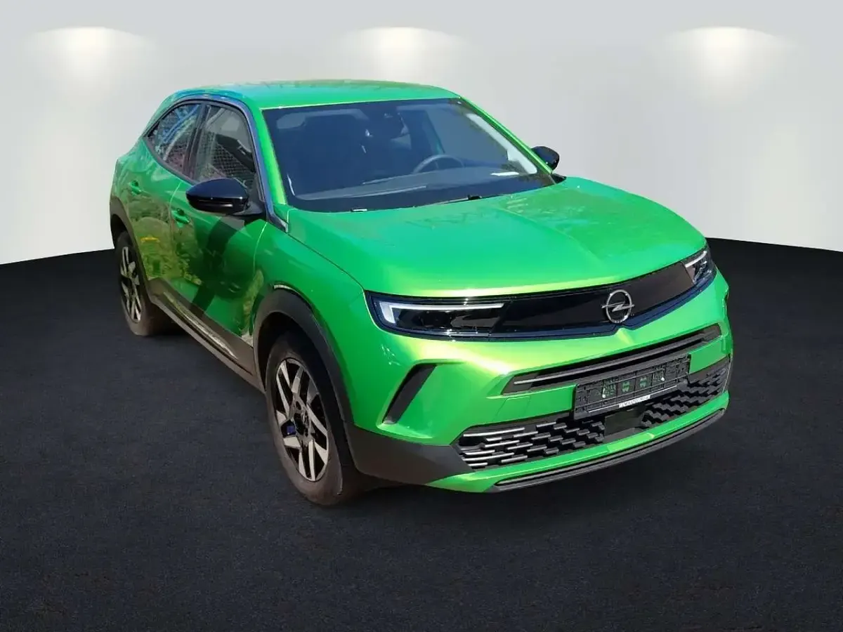 Gebraucht Opel Mokka Elegance 131 PS (96 kW) 2024 Lackierung matcha green/typ aussenverkle (metallic) SUV
