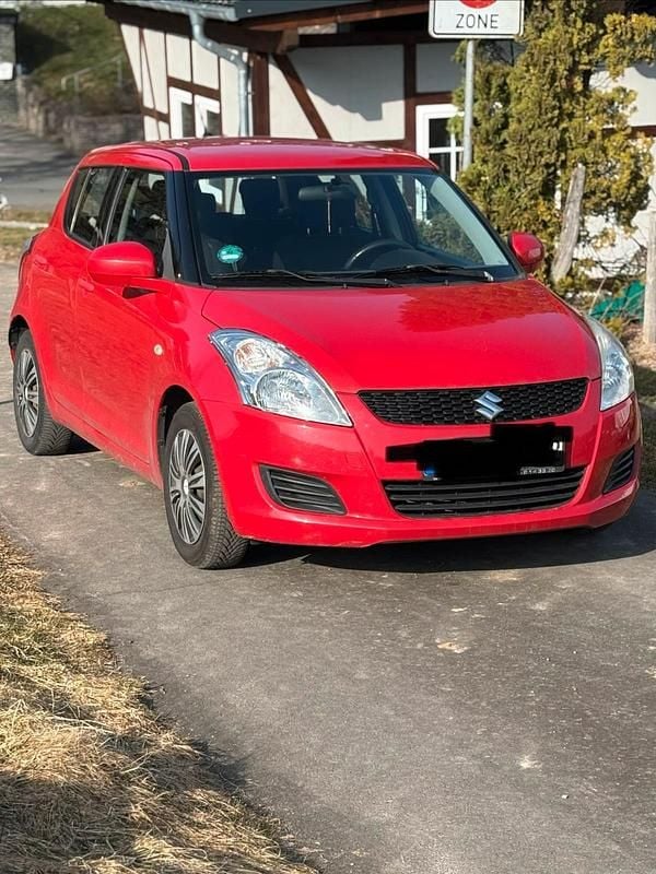 Gebraucht Suzuki Swift 94 PS (69 kW) 2013 Rot Kleinwagen