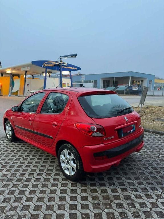 Gebraucht Peugeot 206+ 60 PS (44 kW) 2009 Rot Kleinwagen