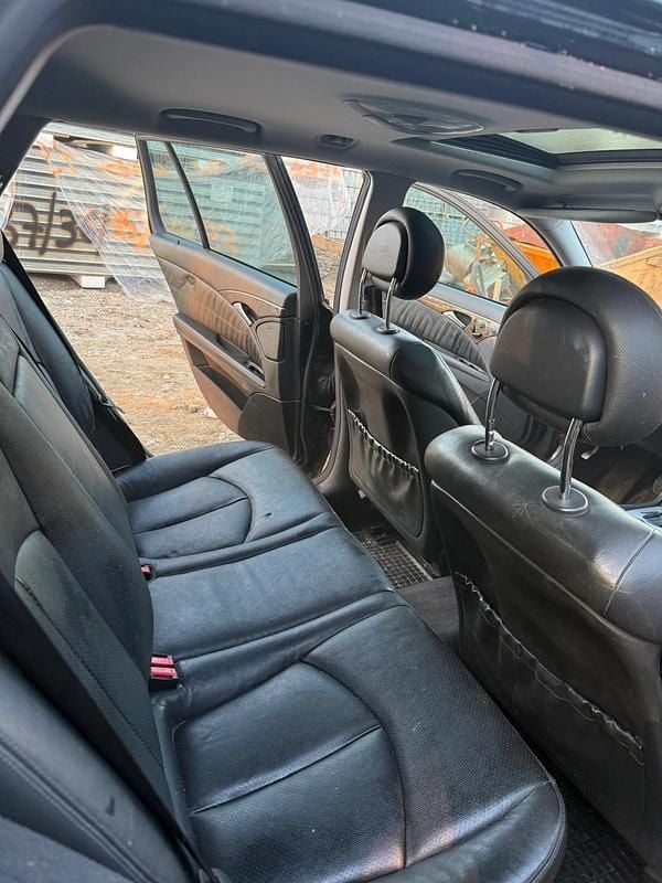 Second-hand Mercedes E320 204 CP (150 kW) 2004 Negru Break