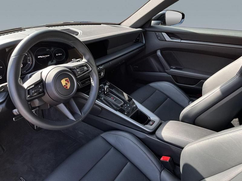 Gebraucht Porsche 992 385 PS (283 kW) 2023 Tiefschwarzmetallic (metallic)