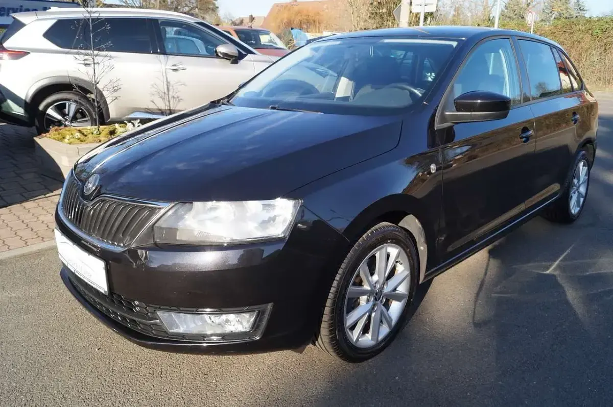 Second-hand Skoda Rapid 105 CP (77 kW) 2013 Negru Hatchback