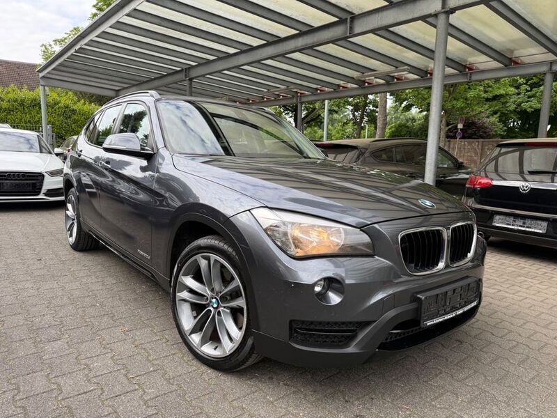 Grau Gebraucht 2013 BMW X1 Sport Line SUV | 9.799 € (Guter Preis) - Bild 1/4