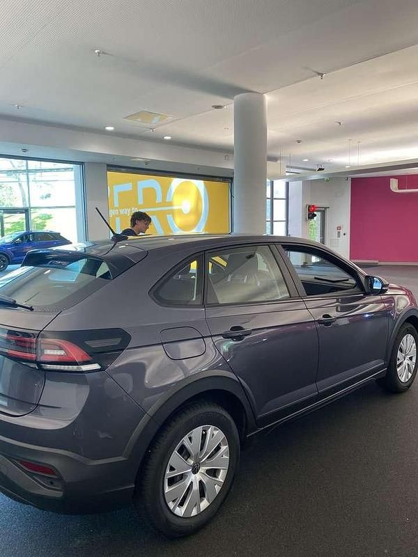 Gebraucht VW Taigo Basis 95 PS (69 kW) 2024 Grau SUV