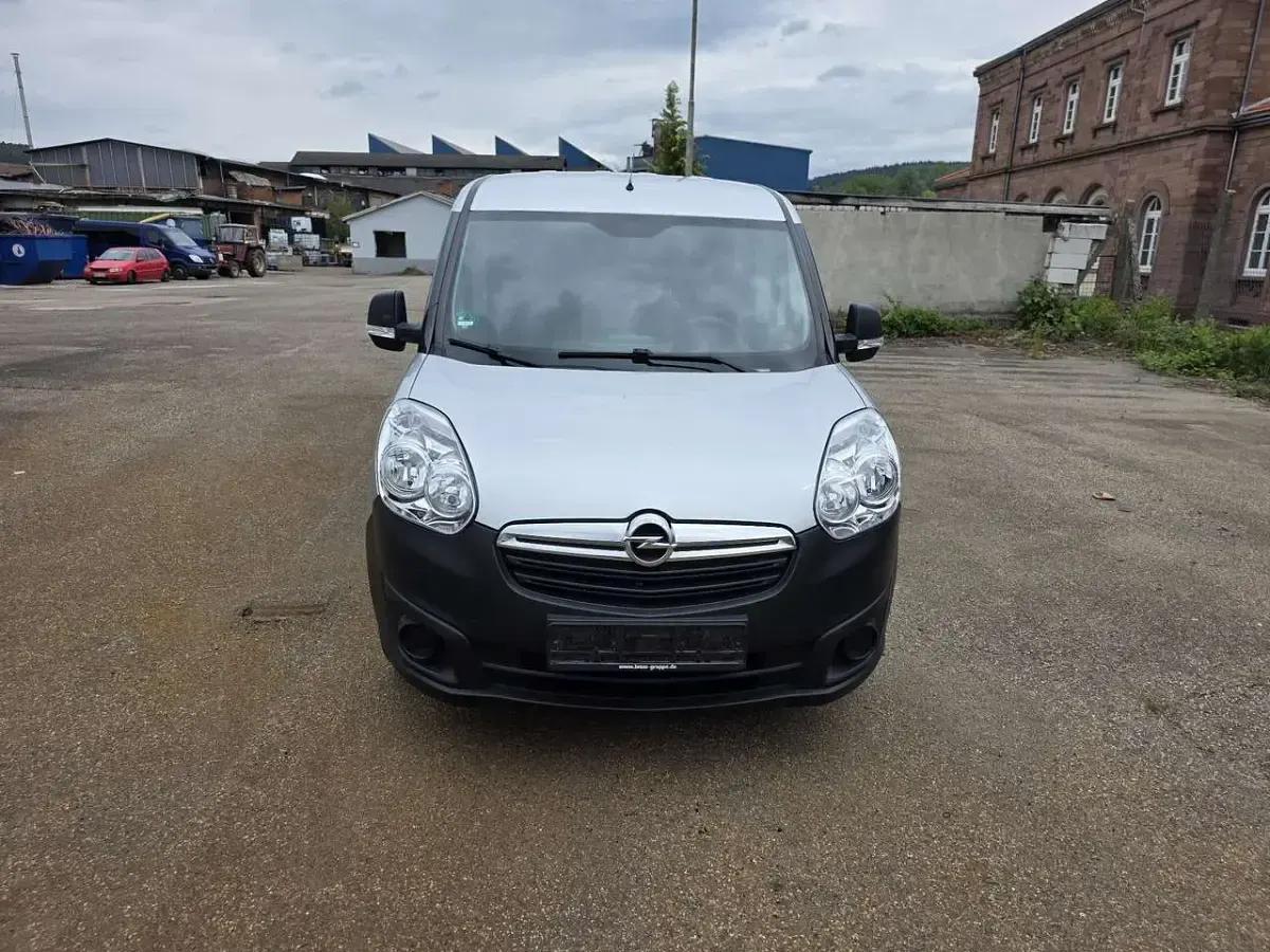 Używany Opel Combo 90 KM (66 kW) 2015 Srebrny Minivan
