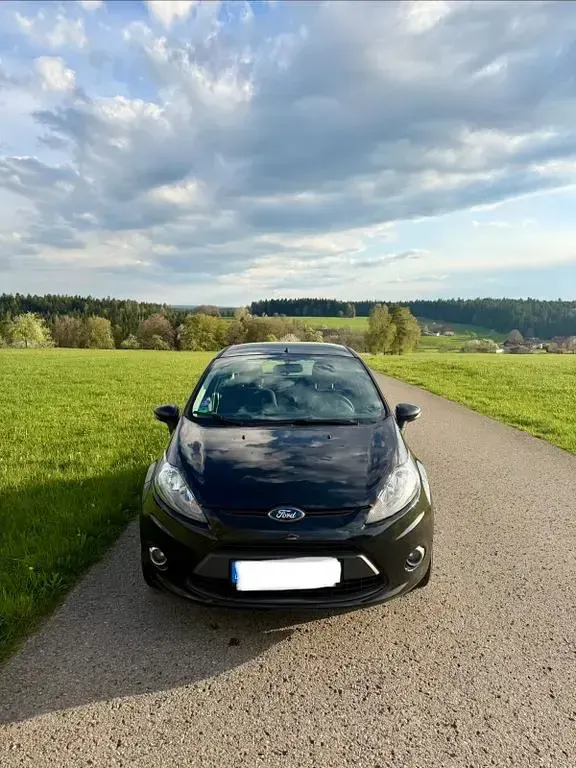 Gebraucht Ford Fiesta Trend 82 PS (60 kW) 2012 Schwarz Limousine