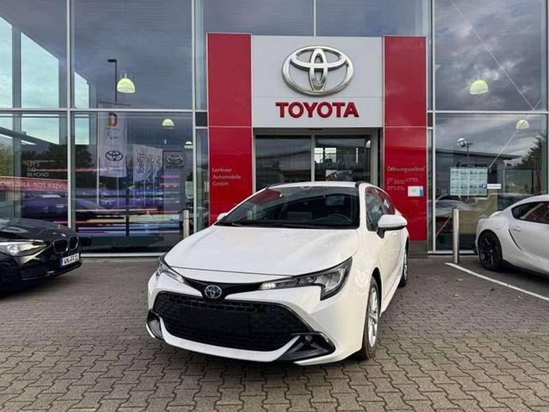 Super white 2 Neu 2024 Toyota Corolla Business Edition Kombi | 34.790 € - Bild 1/4