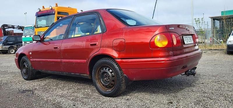 Gebraucht Toyota Corolla 110 PS (80 kW) 2000 Rot Limousine
