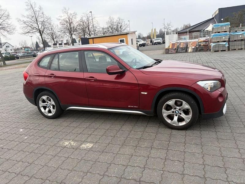 Second-hand BMW X1 xLine 143 CP (105 kW) 2009 Roșu SUV