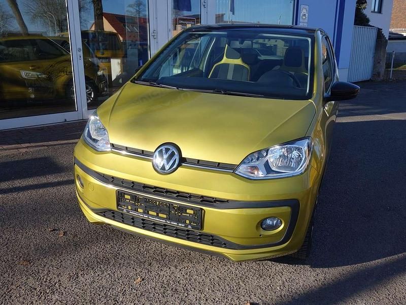 Gebraucht VW up! 75 PS (55 kW) 2017 Honey yellow metallic Kleinwagen