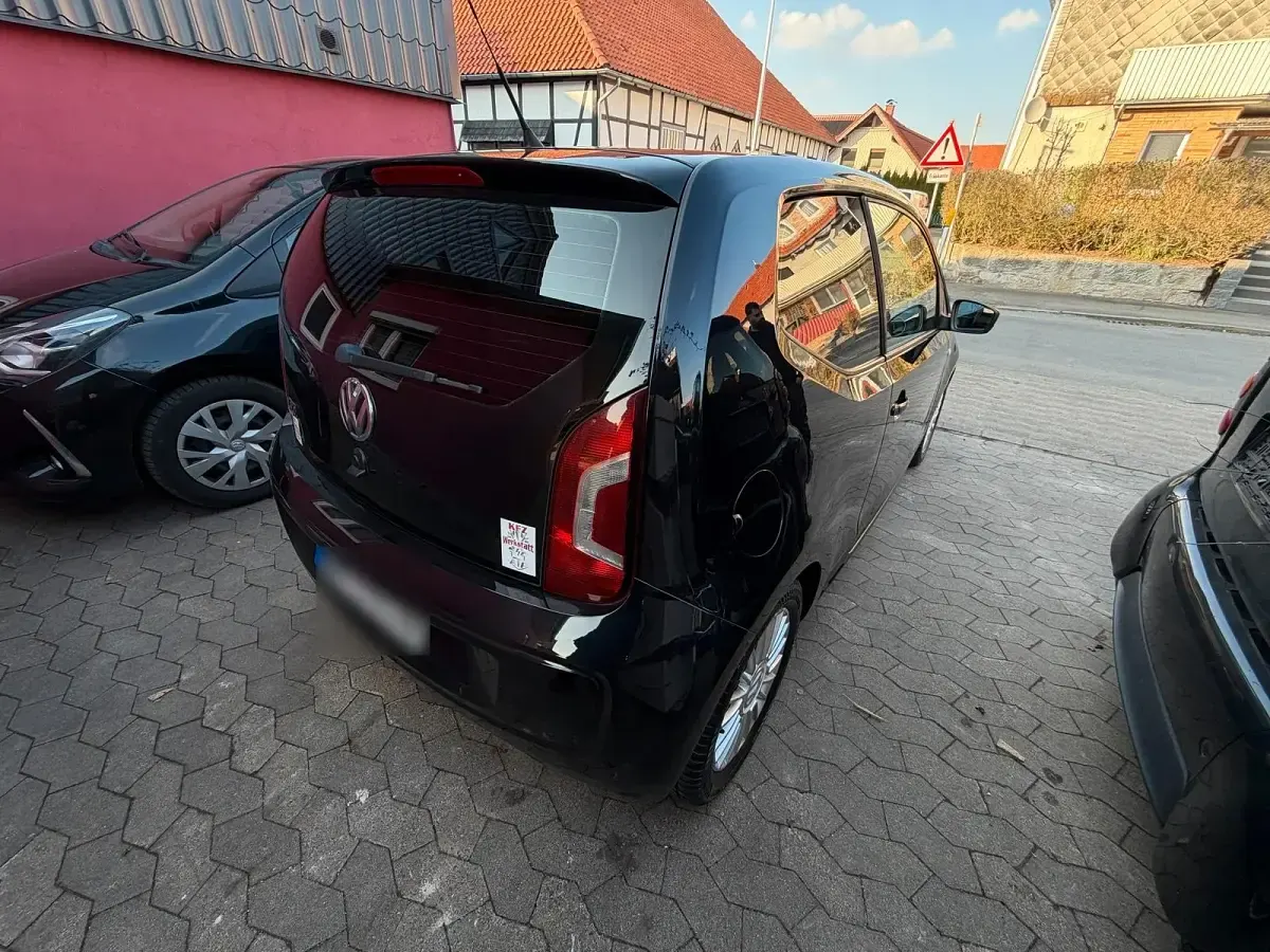 Używany VW up! 60 KM (44 kW) 2012 Czarny Hatchback