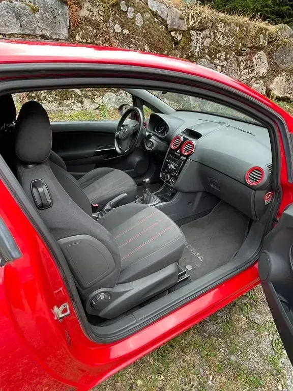 Gebraucht Opel Corsa 101 PS (74 kW) 2010 Rot Kleinwagen