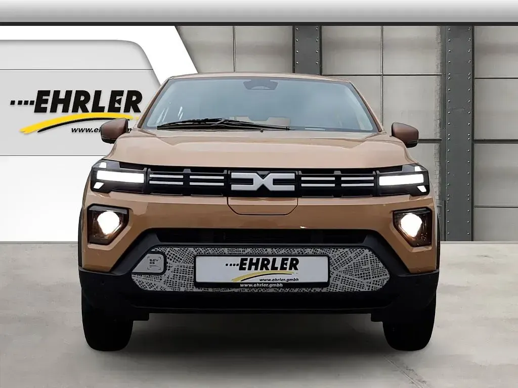 Gebraucht Dacia Spring Extreme 47 kW (65 PS) 2024 Beige Kleinwagen
