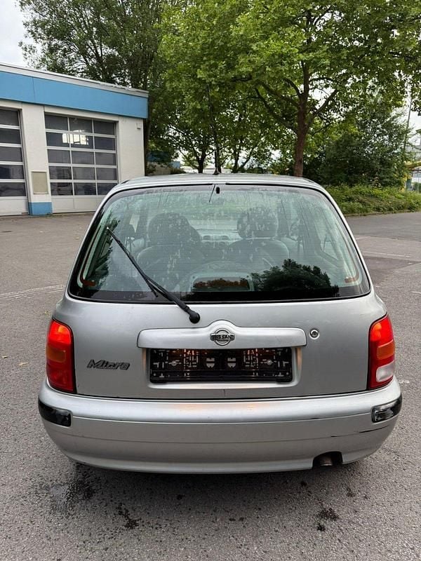 Silber Gebraucht 1999 Nissan Micra Style Edition Kleinwagen | 1.900 € (Fairer Preis) - Bild 1/4