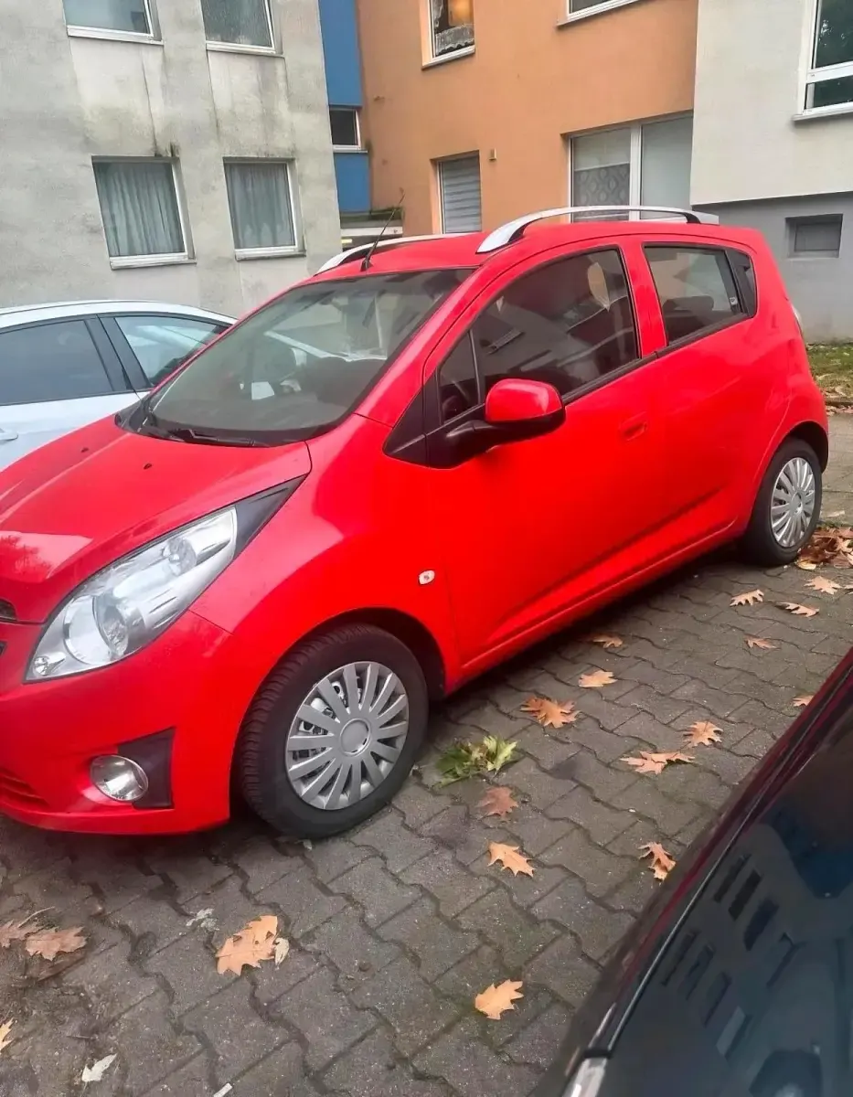 Gebraucht Chevrolet Spark 82 PS (60 kW) 2012 Rot Kleinwagen