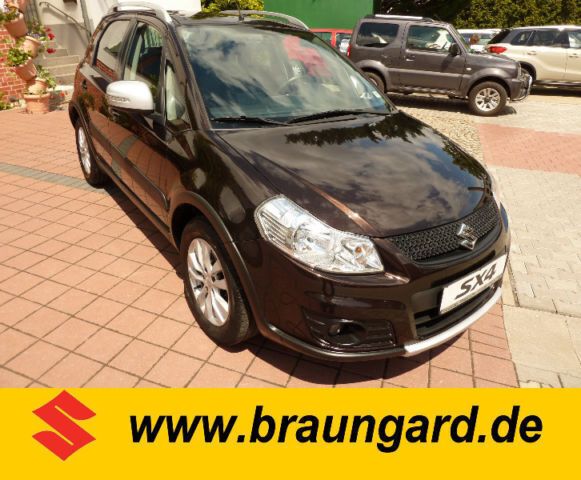 Andere farbe metallic Gebraucht 2013 Suzuki SX4 Style Limousine | 11.450 € (Teuer) - Bild 1/4