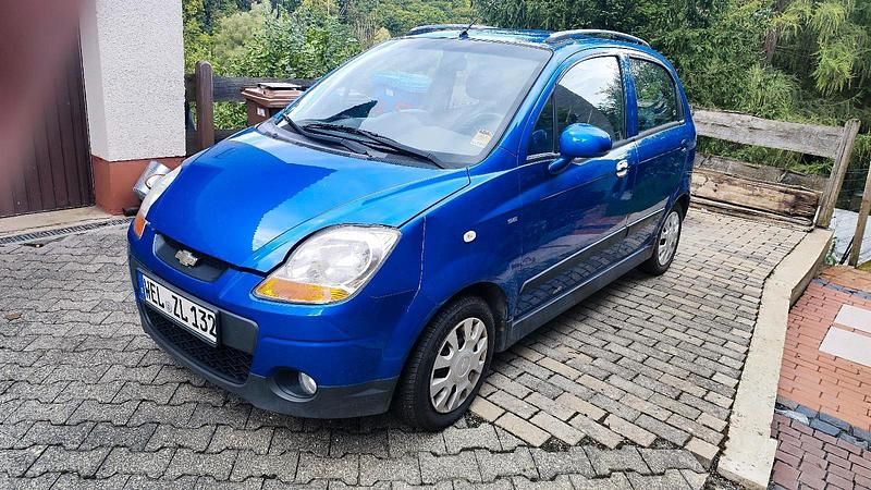 Blau Gebraucht 2009 Chevrolet Matiz Kleinwagen | 1.098 € (Fairer Preis) - Bild 1/4