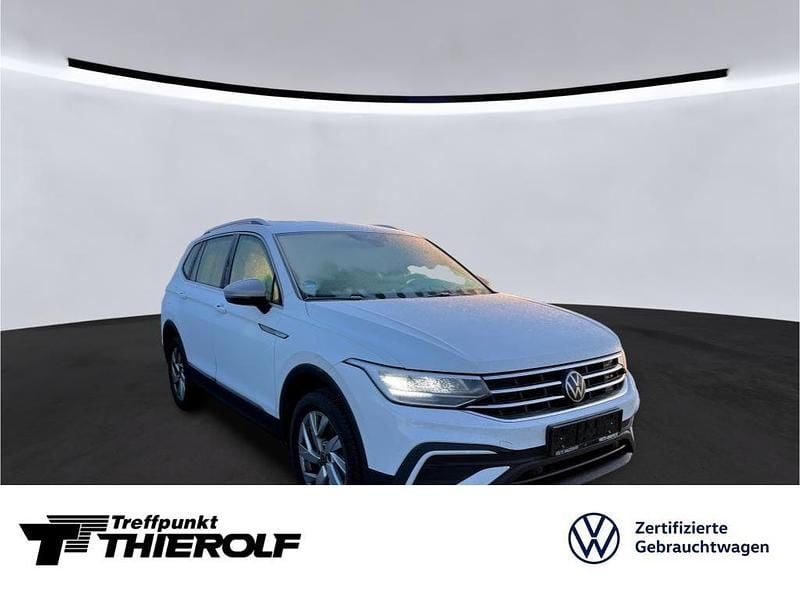 Pure white Gebraucht 2023 VW Tiguan Allspace Life SUV | 32.880 € (Superpreis) - Bild 1/4