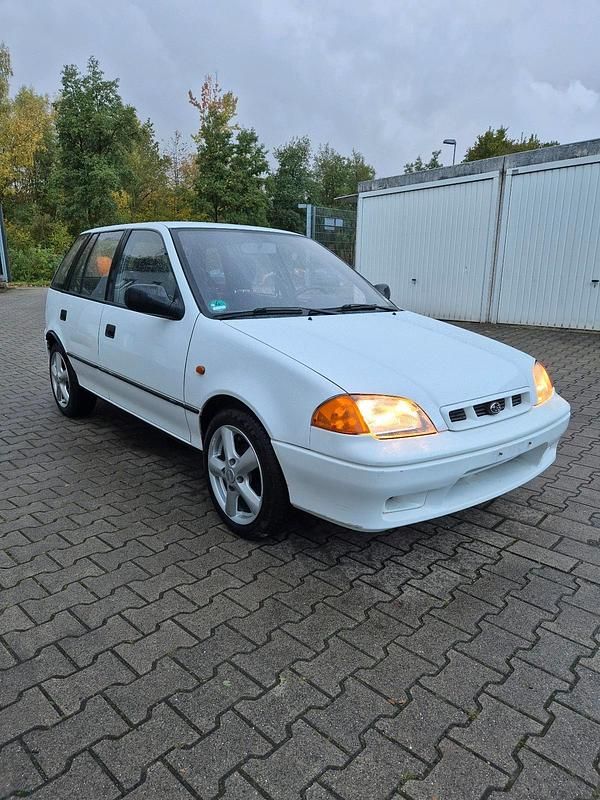Weiß Gebraucht 1998 Subaru Justy Kleinwagen | 3.550 € - Bild 1/4