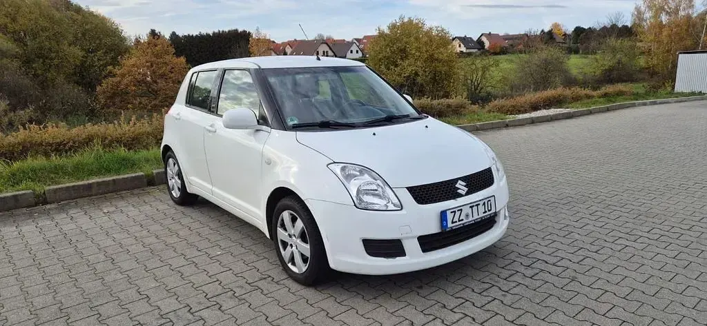 Używany Suzuki Swift 92 KM (67 kW) 2010 Biały Hatchback