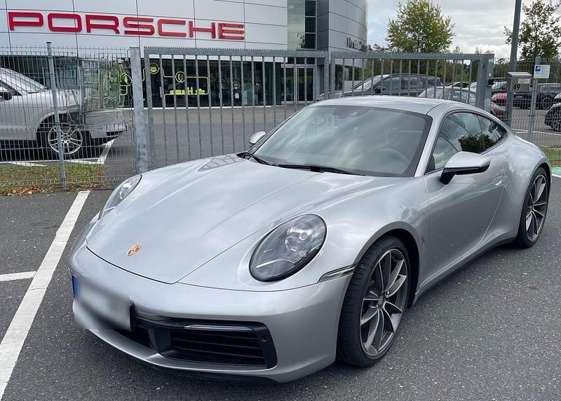 Silber Gebraucht 2023 Porsche 911 Carrera Coupé | 112.992 € (Superpreis) - Bild 1/4