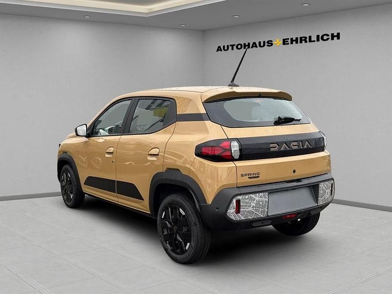 Neu Dacia Spring Extreme 47 kW (65 PS) 2025 Beige safari Kleinwagen
