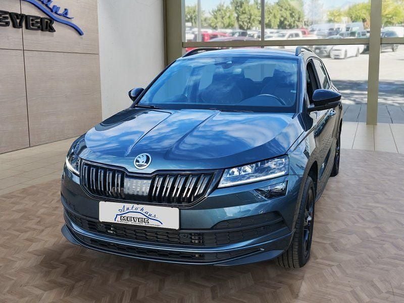 Grau Gebraucht 2020 Skoda Karoq SportLine SUV | 25.400 € (Guter Preis) - Bild 1/4