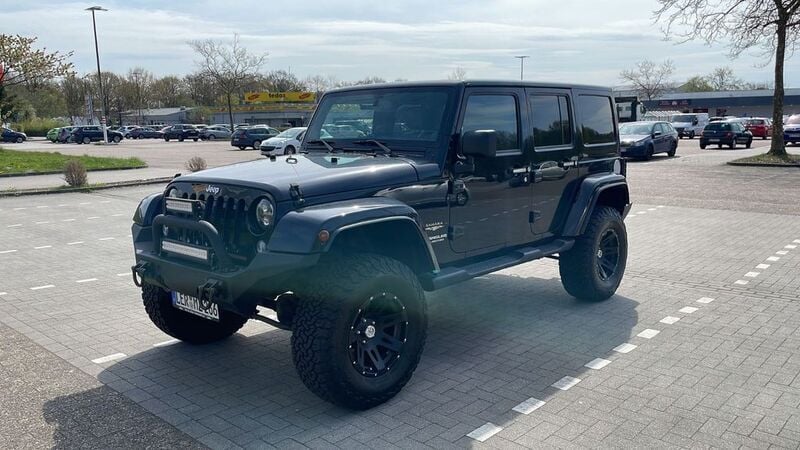 Schwarz Gebraucht 2014 Jeep Wrangler Sahara SUV | 29.999 € (Fairer Preis) - Bild 1/4