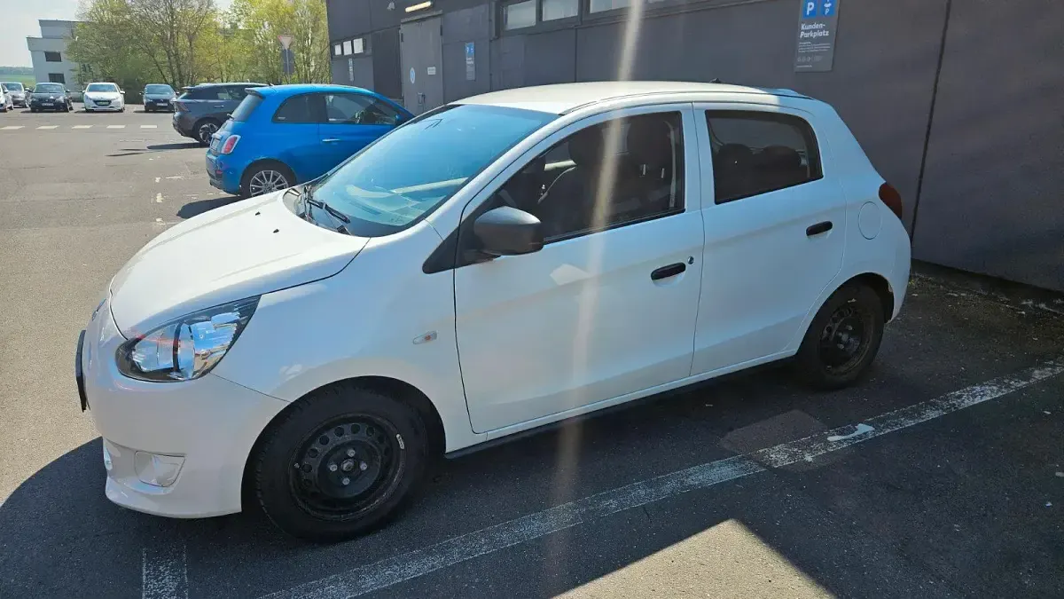 Gebraucht Mitsubishi Space Star 71 PS (52 kW) 2015 Weiß Kleinwagen