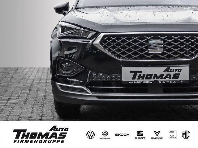 "deep" schwarz perleffekt Gebraucht 2024 Seat Tarraco 4Drive SUV | 38.990 € (Fairer Preis) - Bild 1/3