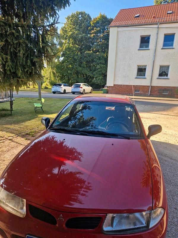 Rot Gebraucht 1999 Mitsubishi Carisma Kleinwagen | 850 € - Bild 1/4
